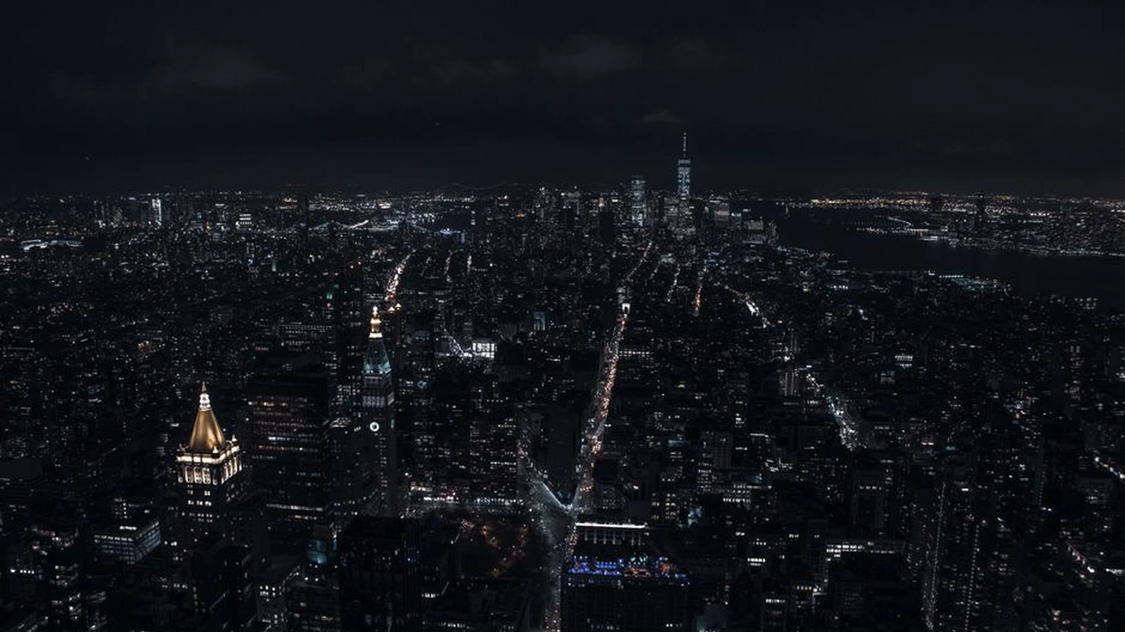 Aerial view of the illuminated New York City skyline at night