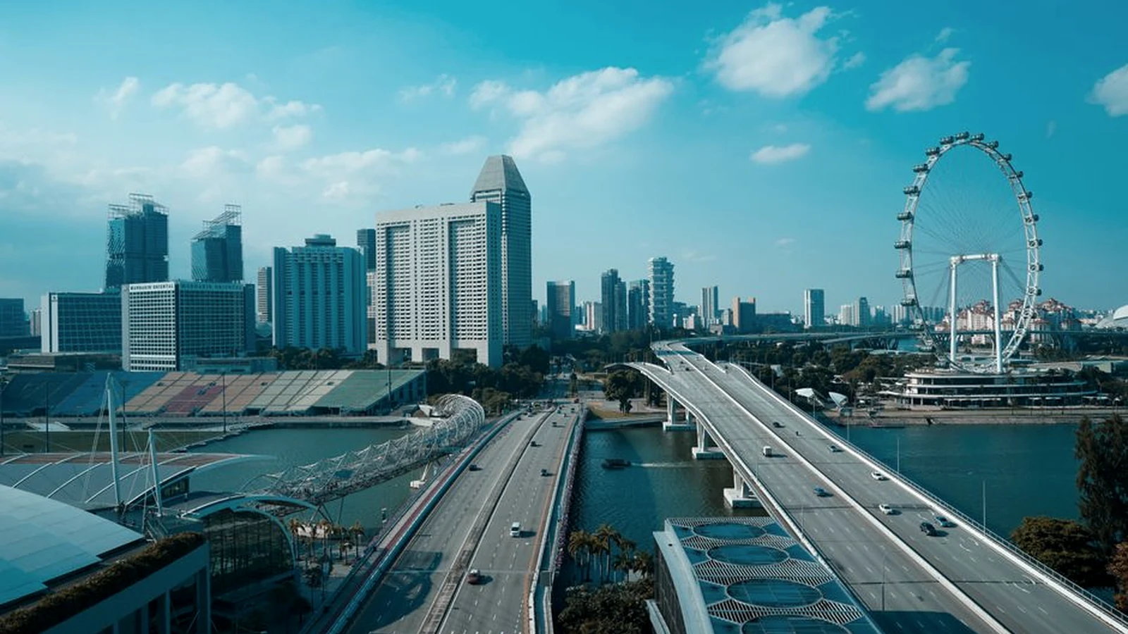Aerial view of Singapore's skyline and Helix Bridge